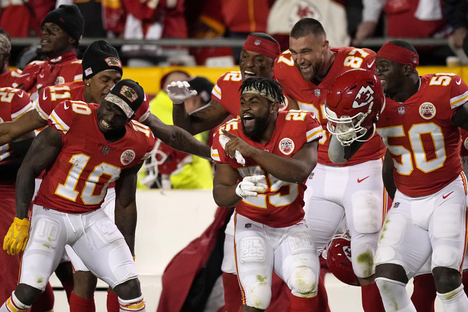 Members of the Kansas City Chiefs celebrate late in the second half of an NFL football game against the Dallas Cowboys Sunday, Nov. 21, 2021, in Kansas City, Mo. (AP Photo/Charlie Riedel)
