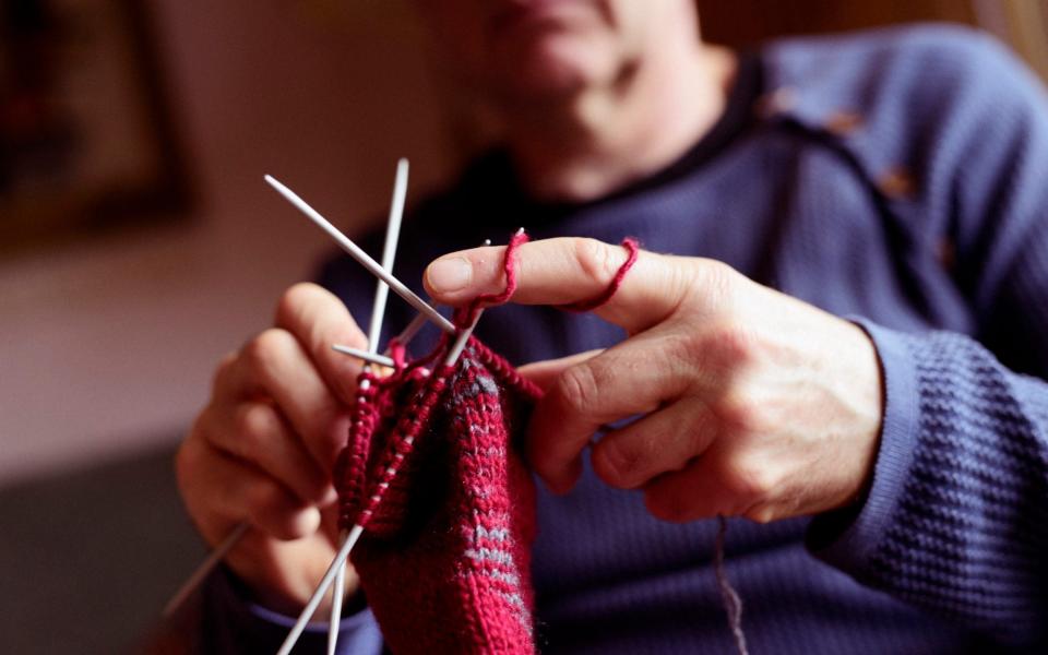 Men are increasingly turning to knitting as a mindfulness exercise - wayra/iStockphoto