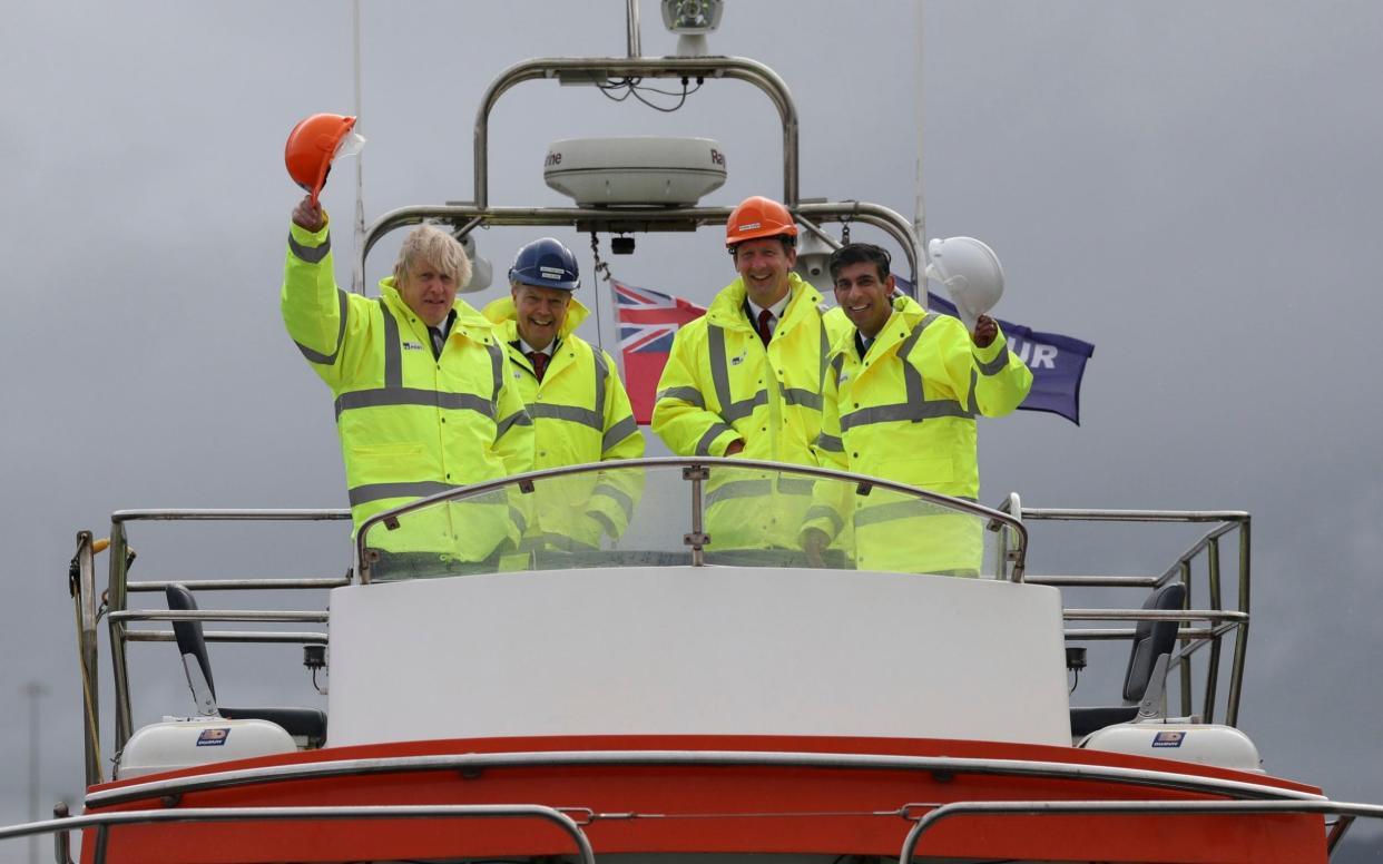 Boris Johnson and Rishi Sunak aboard a boat on the River Tees today - AP Pool