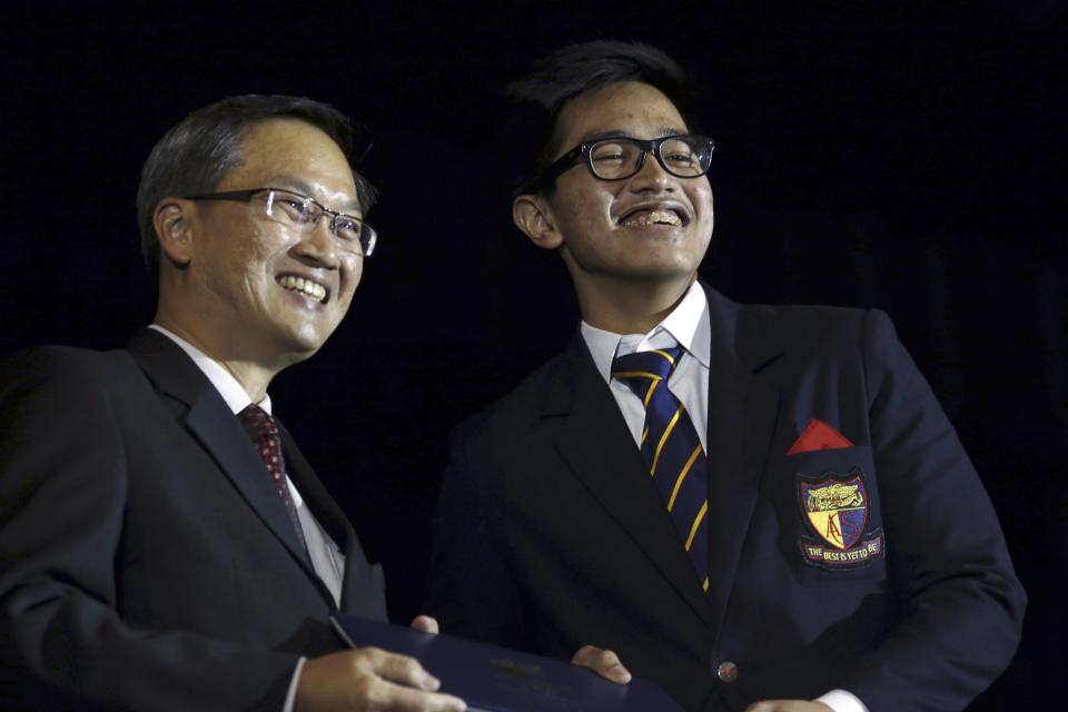 Kaesang Pangarep, son of Indonesian President Joko Widodo, receives his baccalaureate during his graduation ceremony in Singapore