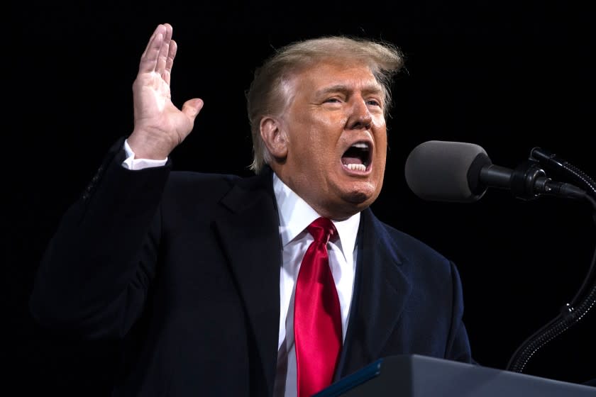 President Donald Trump speaks at a campaign rally for Senate Republican candidates, Sen. Kelly Loeffler, R-Ga., and Sen. David Perdue, R-Ga., at Valdosta Regional Airport, Saturday, Dec. 5, 2020, in Valdosta, Ga. (AP Photo/Evan Vucci)