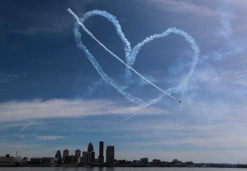 A pilot draws a heart in the sky over Louisville and the Ohio River during the Thunder Over Louisville event on Saturday.
 April 21, 2018.