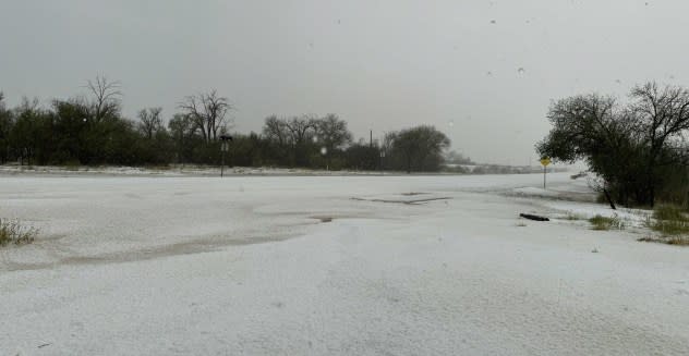 A hailstorm creates a winterlike landscape, dropping the temperature from the 90s into the 50s on May 29, 2024, in Marathon, Texas. (Harry Weinman)