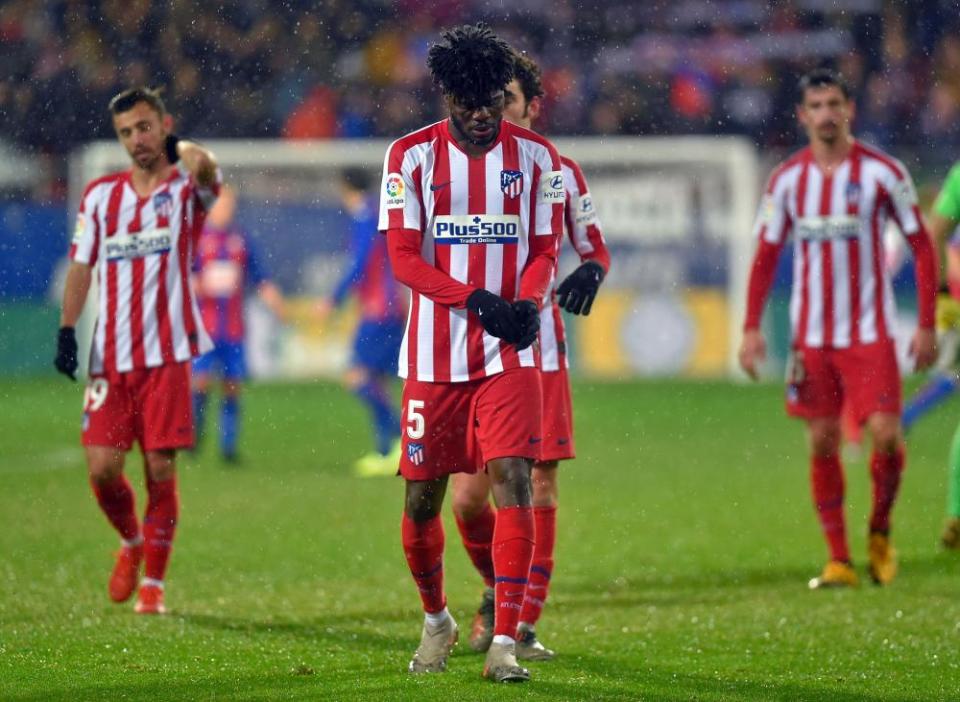 Thomas Partey and dejected teammates after their defeat.