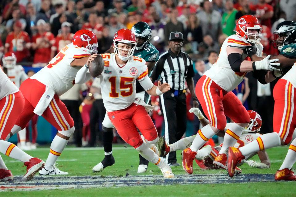 Chiefs quarterback Patrick Mahomes scrambles on a 26-yard run in the fourth quarter.