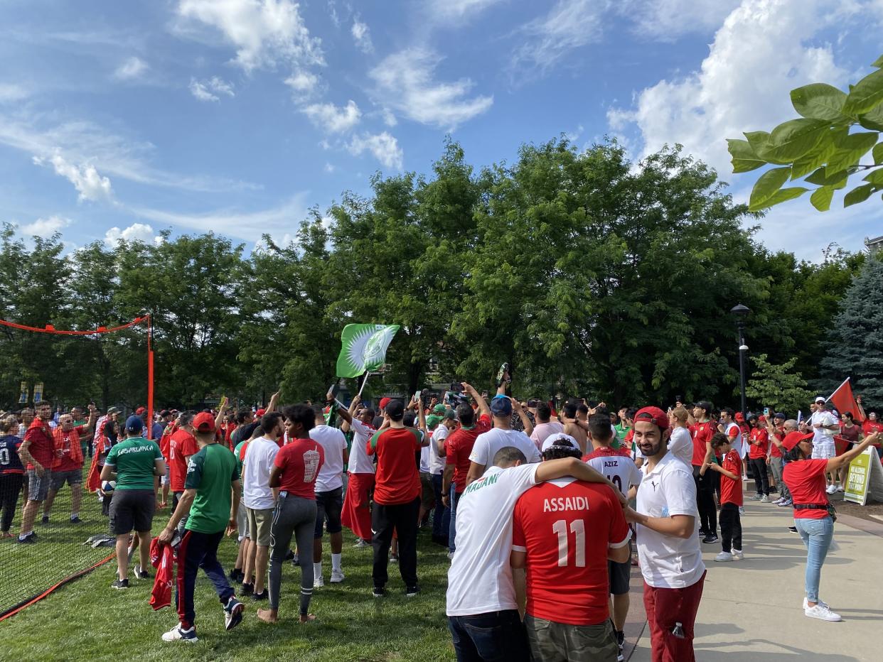 Morocco men's national team fans gather at Washington Park in Cincinnati, a few blocks away from TQL Stadium, before their team's friendly against the U.S. (Henry Bushnell/Yahoo Sports)