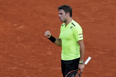 Tennis - French Open - Roland Garros - Jeremy Chardy of France vs Stan Wawrinka of Switzerland - Paris, France - 27/05/16. Stan Wawrinka celebrates. REUTERS/Benoit Tessier