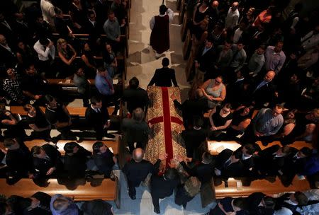 The casket of Christopher Leinonen, who was killed at the Pulse gay nightclub, arrives at Cathedral Church of St. Luke for a funeral service in Orlando, Florida, June 18, 2016. REUTERS/Jim Young