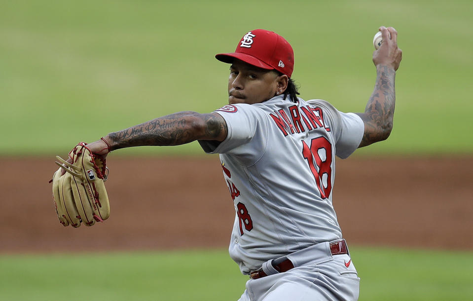 St. Louis Cardinals pitcher Carlos Martínez works against the Atlanta Braves in the first inning of a baseball game Friday, June 18, 2021, in Atlanta. (AP Photo/Ben Margot)