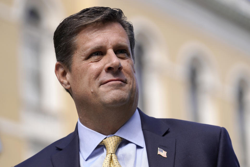 FILE - Republican gubernatorial candidate Geoff Diehl speaks to reporters outside the Statehouse, in Boston, March 21, 2022. Diehl, who has former President Donald Trump’s endorsement, is going up against businessman Chris Doughty, a political newcomer, in the Republican primary for governor on Tuesday, Sept. 6. (AP Photo/Steven Senne, File)