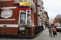 LONDON, ENGLAND - AUGUST 15: Women walk past the Ecuadorian Embassy where Julian Assange, the founder of the WikiLeaks website, is seeking asylum on August 15, 2012 in London, England. Mr Assange has been living inside Ecuador's London embassy since June 19, 2012 after requesting political asylum whilst facing extradition to Sweden to face allegations of sexual assault. According to officials within Ecuador's government, Assange is to be granted asylum. (Photo by Oli Scarff/Getty Images)