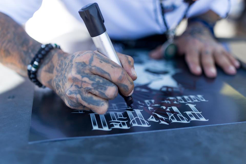 Payaso was invited to a meet and greet at the grand opening of his friend Dreamer’s new dispensary, Garden of Dreams Cannabis, in Santa Teresa, New Mexico, on Saturday, Oct. 28, 2023, taking photos with fans and signing posters for them.