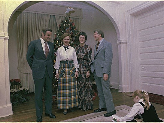 Jimmy Carter and Rosalynn Carter with Walter Mondale and Joan Mondale for dinner at the Vice-President's residence.