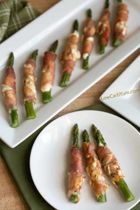 <p>Low Carb Yum</p><p>Your friends and family will love this prosciutto wrapped asparagus cream cheese appetizer. It’s a tasty low-carb dish that requires only three ingredients.</p><p><strong>Get the recipe: </strong><a href="https://lowcarbyum.com/prosciutto-wrapped-asparagus-cream-cheese/" rel="nofollow noopener" target="_blank" data-ylk="slk:Prosciutto Wrapped Asparagus Cream Cheese;elm:context_link;itc:0;sec:content-canvas" class="link "><strong>Prosciutto Wrapped Asparagus Cream Cheese</strong></a></p>