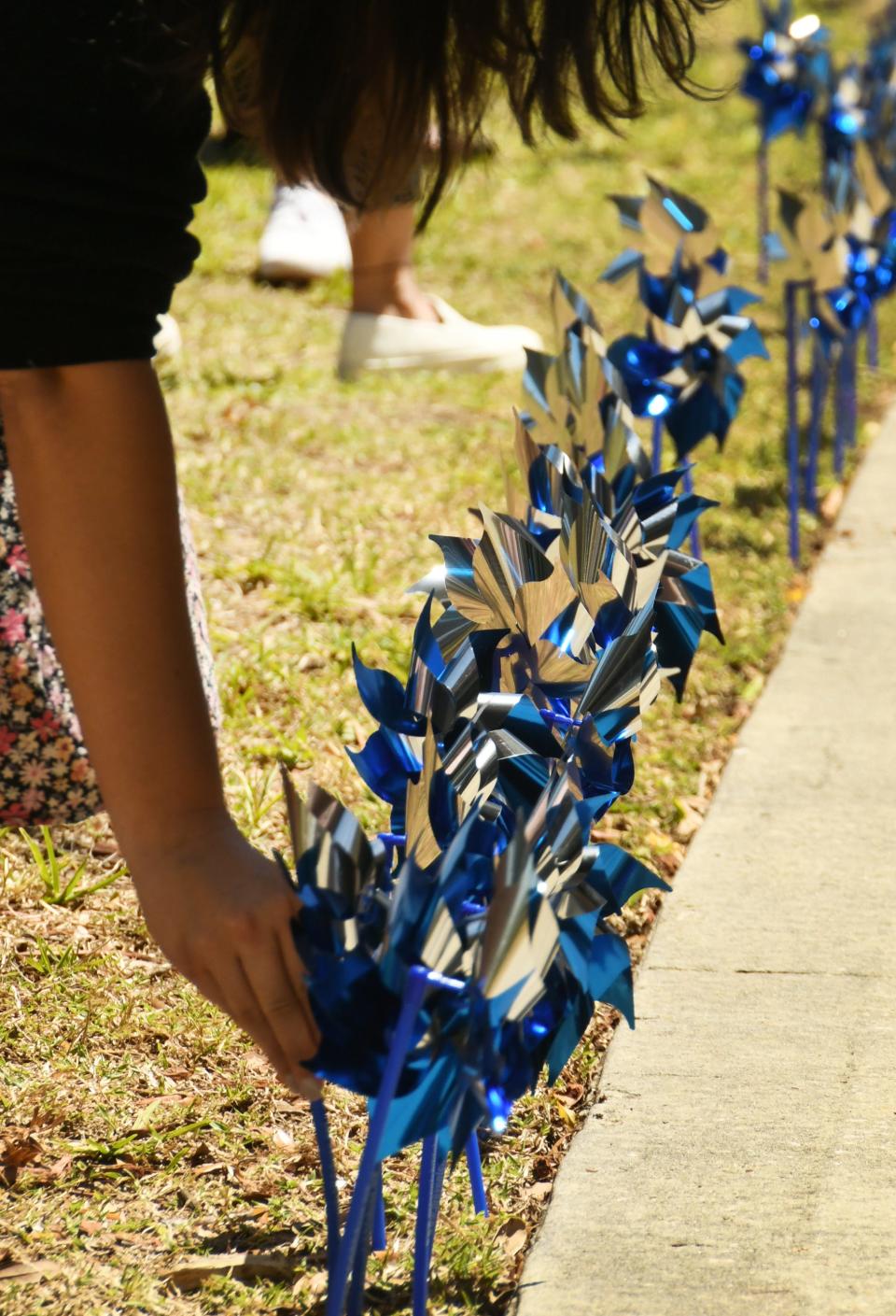  The Child Abuse Prevention Task Force, court staff,  child welfare professionals from several agencies, and others took part in the April 18 Pinwheel Planting and a proclamation read by Circuit Judge Kelly J. McKibben, including words by Governor Ron DeSantis, outside the Moore Justice Center in Viera. 