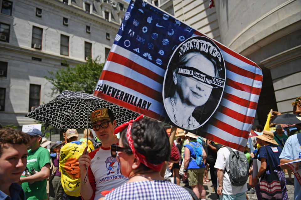 Demonstrators protest outside the DNC