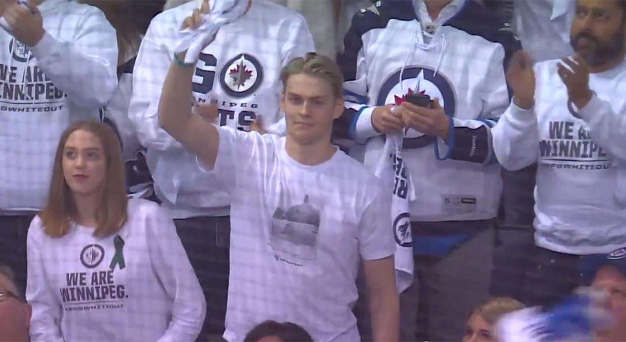 Humboldt Broncos player Matthieu Gomeric receives a standing ovation from the MTS Centre crowd.