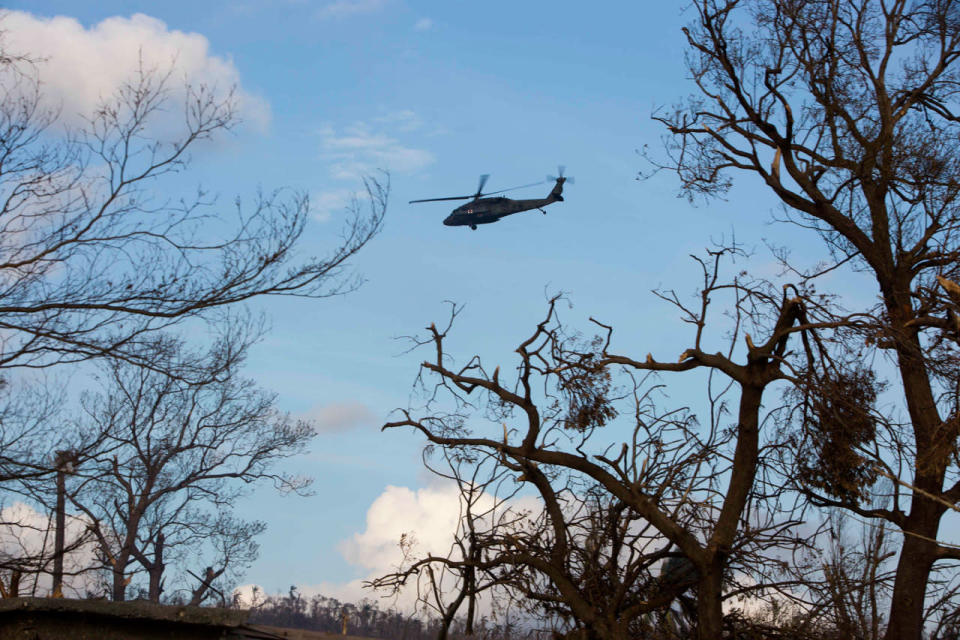 <p>A United States armed forces helicopter flies past in Dame-Marie, Haiti on Monday, Oct. 10, 2016. (AP Photo/Dieu Nalio Chery)</p>