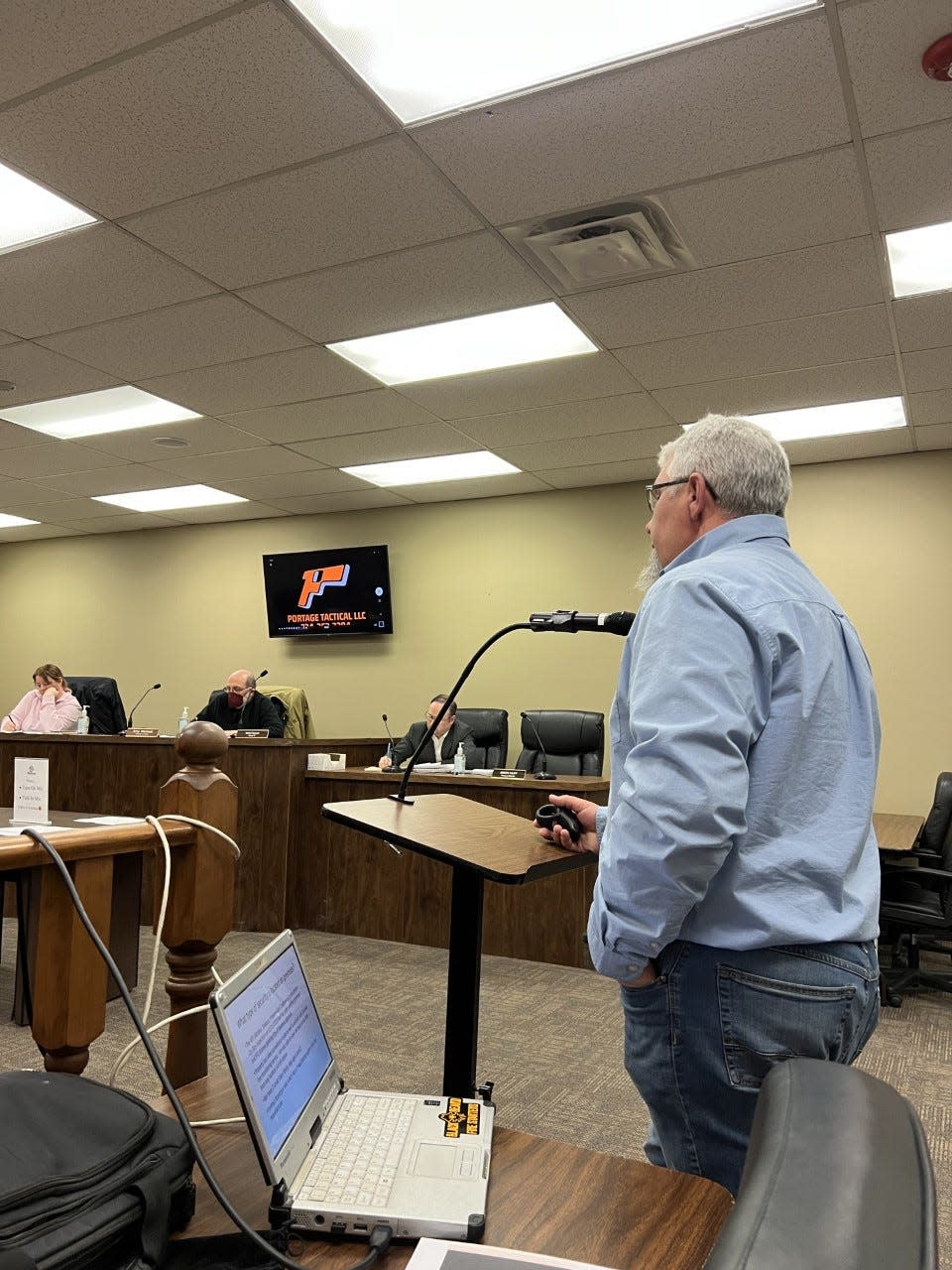 Arthur Hrdlicka, owner of Portage Tactical, presents plans for his home-based business to the Ravenna Planning Commission. Hrdlicka was granted a conditional use permit allowing him to sell firearms from his Ravenna home.