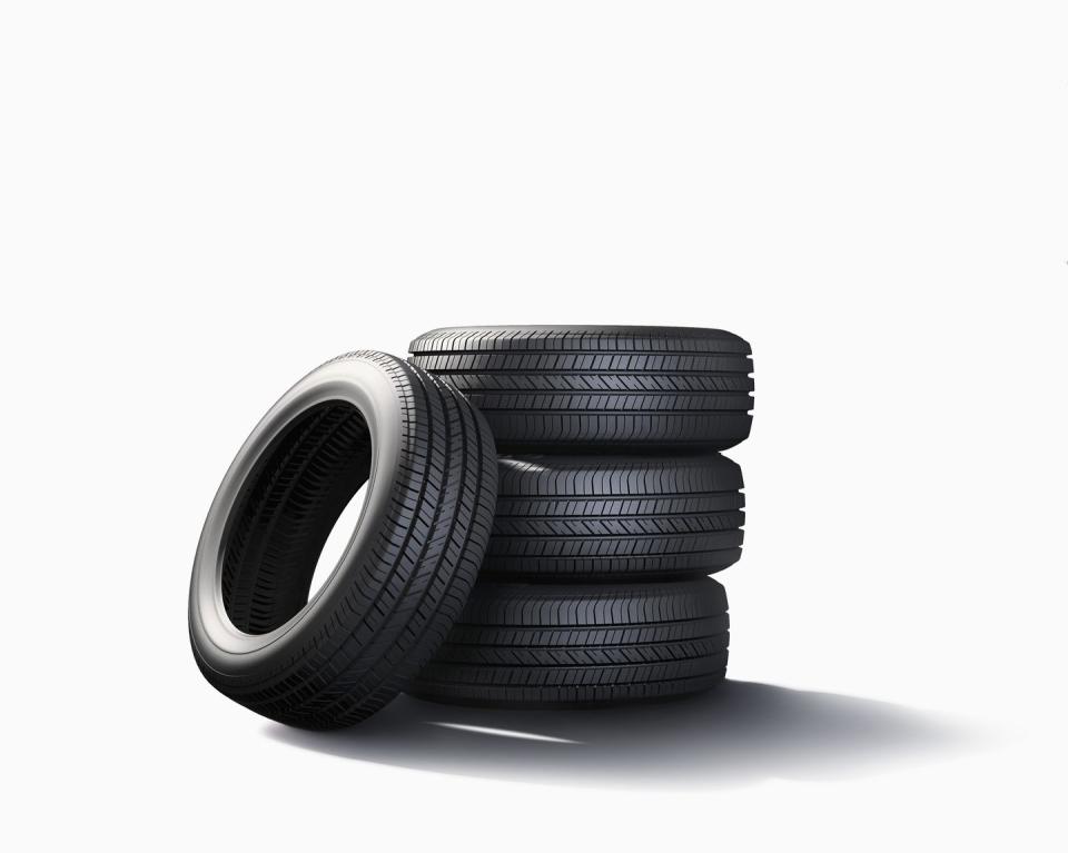 pile of tires on white background