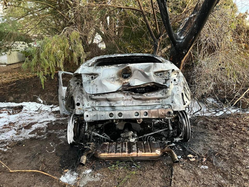 The Cambridge Rescue Fire Company posted this photo of the vehicle involved in a police chase through three counties that caught fire after crashing.