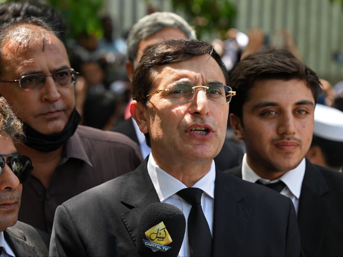 Gohar Khan (C), leading lawyer of the legal team of imprisoned Pakistan’s former prime minister Imran Khan, was elected as the new chairperson of PTI on Saturday  (AFP via Getty Images)