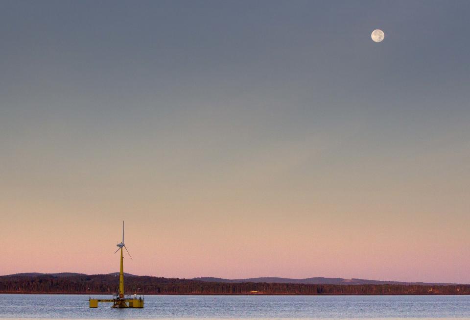 FILE - This Friday, Sept. 20, 2013 file photo shows the country's first floating wind turbine works off the coast of Castine, Maine. Oregon and federal officials are announcing a new effort to tap into offshore wind energy resources in federal waters along the West Coast. Gov. John Kitzhaber, U.S. Secretary of the Interior Sally Jewell and Bureau of Ocean Energy Management Director Tommy Beaudreau are making the announcement at a press conference Wednesday, Feb. 5, 2014. (AP Photo/Robert F. Bukaty, File)