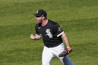 Chicago White Sox relief pitcher Liam Hendriks celebrates striking out Minnesota Twins' Trevor Larnach in the ninth inning of a baseball game giving the White Sox a 4-2 win and series sweep Thursday, May 13, 2021, in Chicago. (AP Photo/Charles Rex Arbogast)