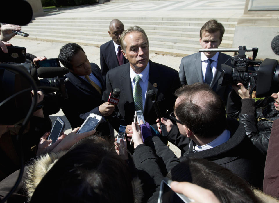 FILE - In this March 21, 2016, file photo, Rep. Chris Collins, R-N.Y., speaks with reporters as he leaves a closed-door meeting with Republican presidential candidate Donald Trump in Washington. The fight for control of the U.S. House includes some key contests Tuesday, Nov. 6, 2018, in New York, where a handful of vulnerable Republicans are hoping to beat back invigorated, well-funded Democratic challengers. The most unusual race could be in western New York, where Collins is trying to win a fourth term three months after he was indicted on federal insider trading charges. ( AP Photo/Jose Luis Magana, File)