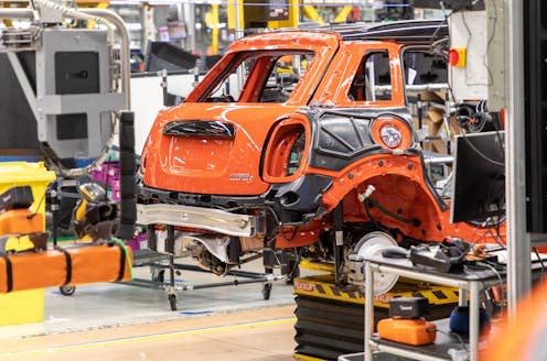<span class="caption">A car completed on a UK production line will include 'value' that was created overseas.</span> <span class="attribution"><a class="link " href="https://www.shutterstock.com/image-photo/oxford-oxfordshire-uk-february-26-2020-1663344208" rel="nofollow noopener" target="_blank" data-ylk="slk:Tristan Young/Shutterstock;elm:context_link;itc:0;sec:content-canvas">Tristan Young/Shutterstock</a></span>
