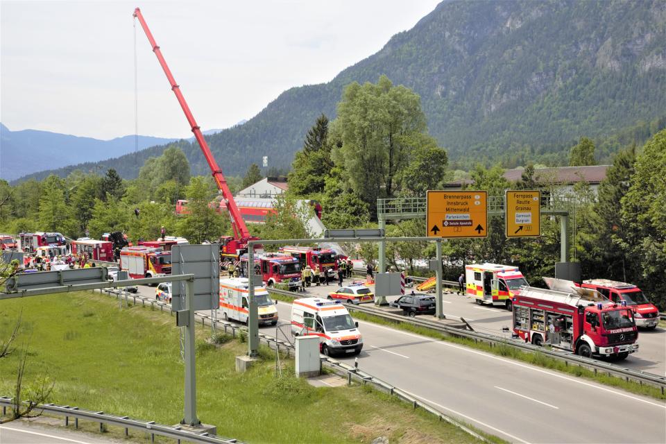 Numerous emergency and rescue forces are in action after a serious train accident in Garmisch-Partenkirchen, Germany, Friday, June 3, 2022. According to the authorities, at least three people have been killed and many injured. (Josef Hornsteiner/dpa via AP)