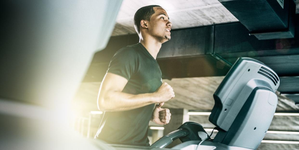 healthy man running on treadmill