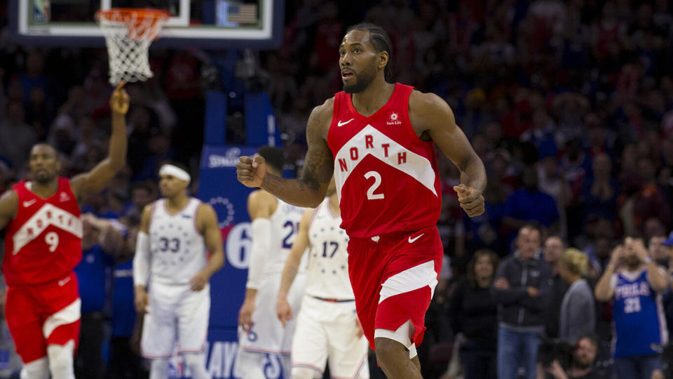 Kawhi Leonard #2 reacts after making a three-point basket against the Philadelphia 76ers in the fourth quarter. (Photo by Mitchell Leff/Getty Images)