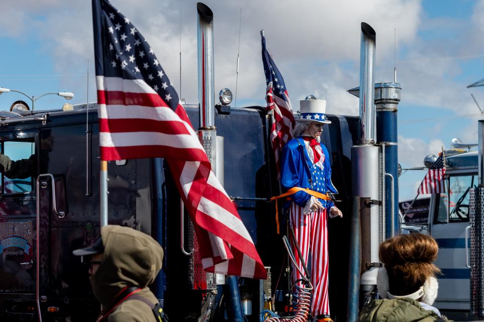 A mannequin of Uncle Sam stands attached to a truck at the People's Convoy rally, a movement opposing COVID-19 mandates, in Adelanto Stadium in Adelanto on Wednesday, Feb. 23, 2022.