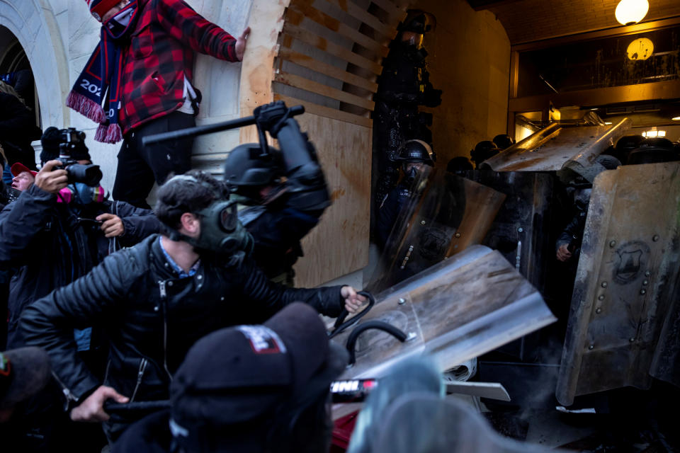 WASHINGTON, DC - JANUARY 6: Trump supporters clash with police and security forces as people try to storm the US Capitol on January 6, 2021 in Washington, DC. - Demonstrators breeched security and entered the Capitol as Congress debated the 2020 presidential election Electoral Vote Certification. (photo by Brent Stirton/Getty Images)