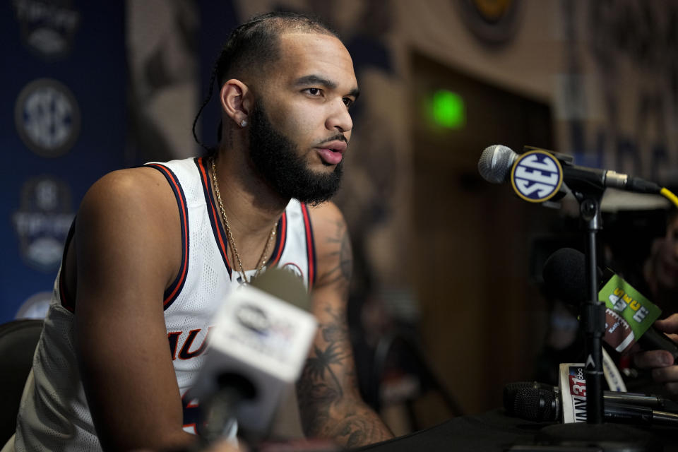 Auburn NCAA college basketball player Johni Broome speaks during Southeastern Conference Media Days, Wednesday, Oct. 18, 2023, in Birmingham, Ala. (AP Photo/Mike Stewart)