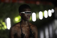 A model wears a creation as part of the Palm Angels men's Spring-Summer 2020 collection, unveiled during the fashion week, in Milan, Italy, Sunday, June 16, 2019. (AP Photo/Luca Bruno)