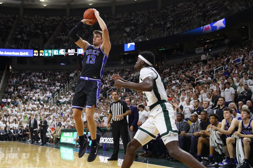 EAST LANSING, MICHIGAN - DECEMBER 03: Joey Baker #13 of the Duke Blue Devils takes a second half shot next to Gabe Brown #44 of the Michigan State Spartans at Breslin Center on December 03, 2019 in East Lansing, Michigan. Duke won the game 87-75.
 (Photo by Gregory Shamus/Getty Images)