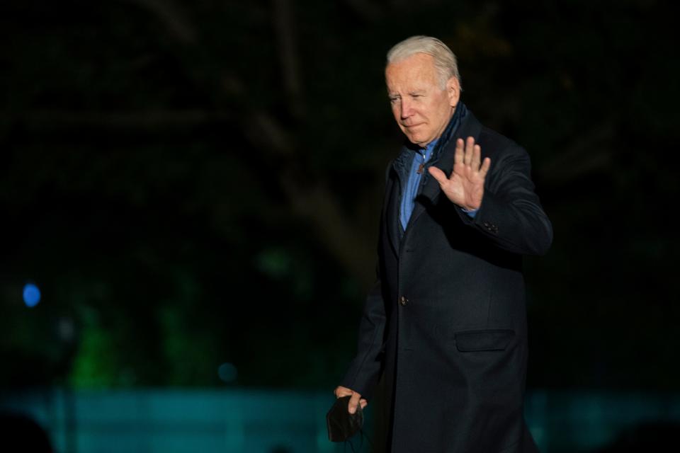 President Joe Biden walks on the South Lawn as he arrives at the White House early Wednesday, Nov. 3, 2021 in Washington from a European trip. (AP Photo/Manuel Balce Ceneta) ORG XMIT: DCMC105