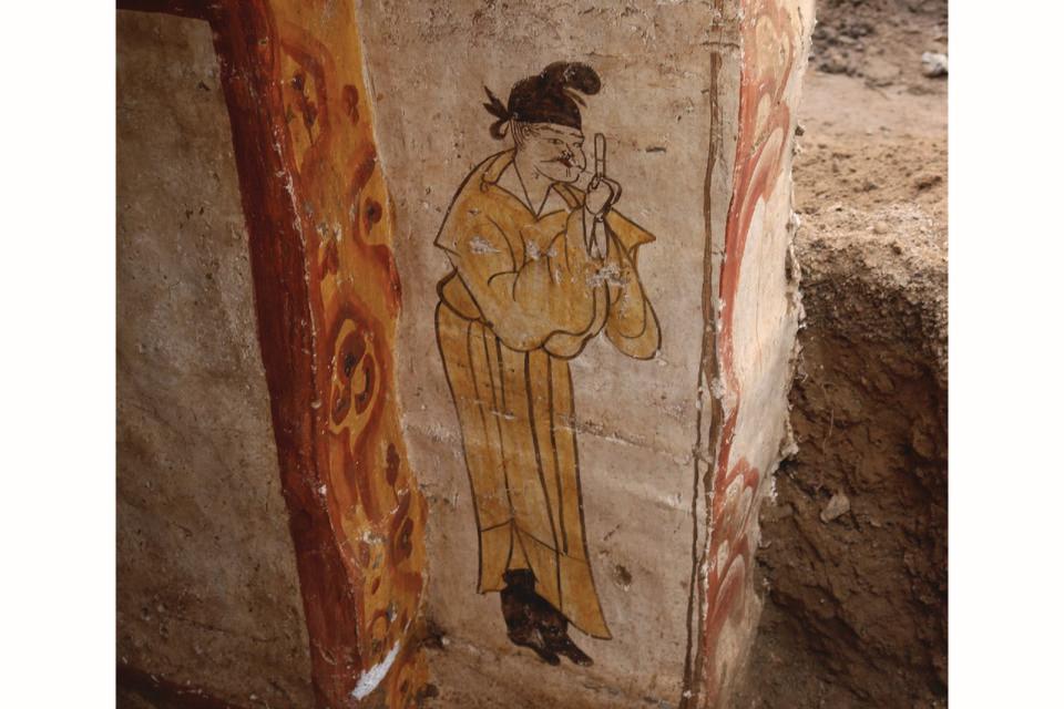 A mural showing a man near the edge of the wall