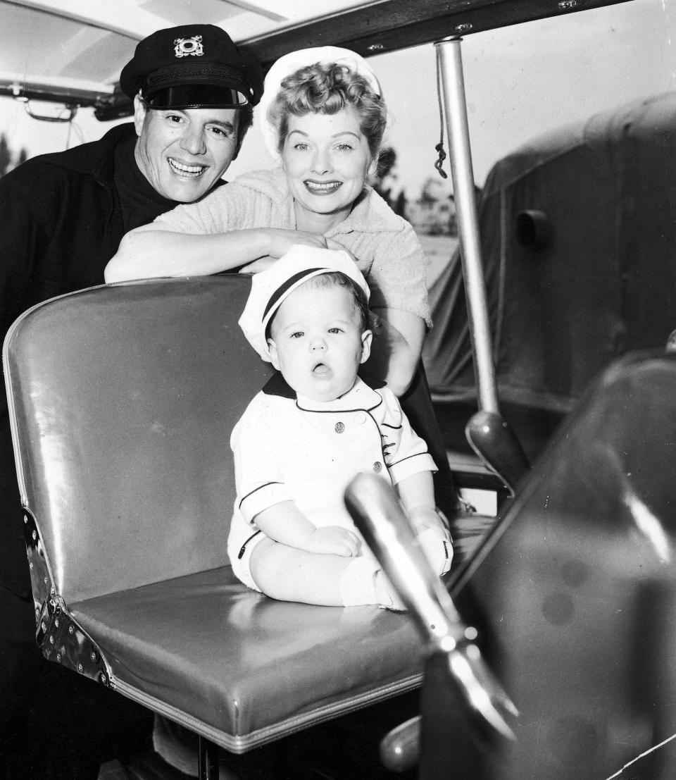 With Arnaz and their daughter Lucie on board their boat, the Desilu, in 1954. 