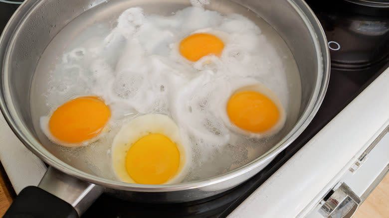 Poached eggs in pot