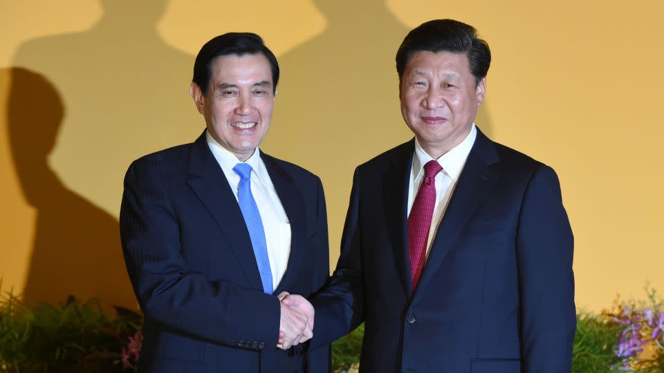 Chinese leader Xi Jinping shakes hands with then Taiwan President Ma Ying-jeou before their meeting in Singapore on November 7, 2015. - Roslan Rahman/AFP/Getty Images