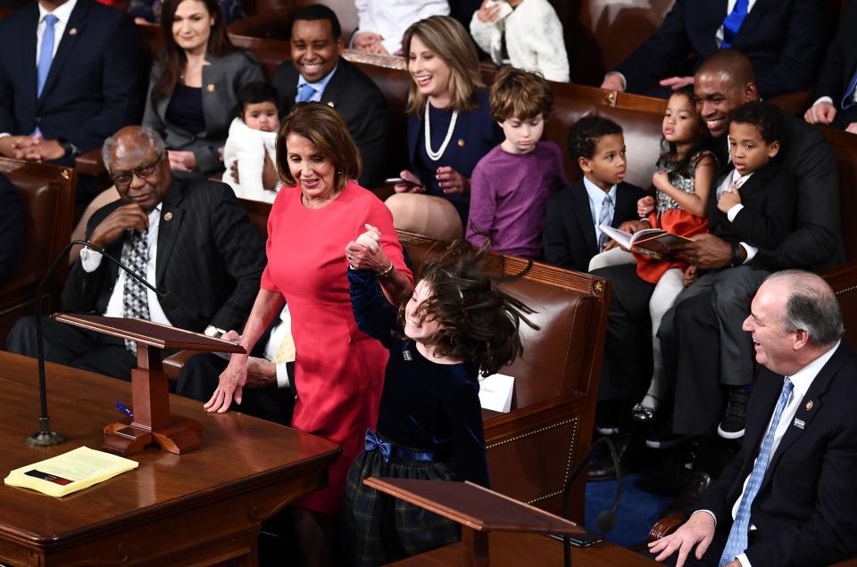 Incoming House Speaker Nancy Pelosi (D-CA) and her granddaughter attend the opening session of the 116th Congress at the US Capitol in Washington, DC, January 3, 2019.