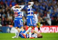 Football - Reading v Arsenal - FA Cup Semi Final - Wembley Stadium - 18/4/15 Reading's Alex Pearce (bottom) looks dejected at the end of the match Reuters / Darren Staples Livepic