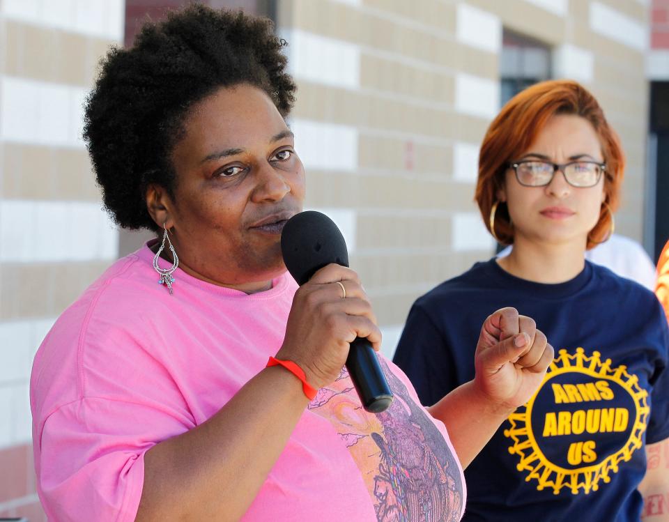 Metcalfe Park Community Bridges director Danell Cross speaks at a community event in 2014.