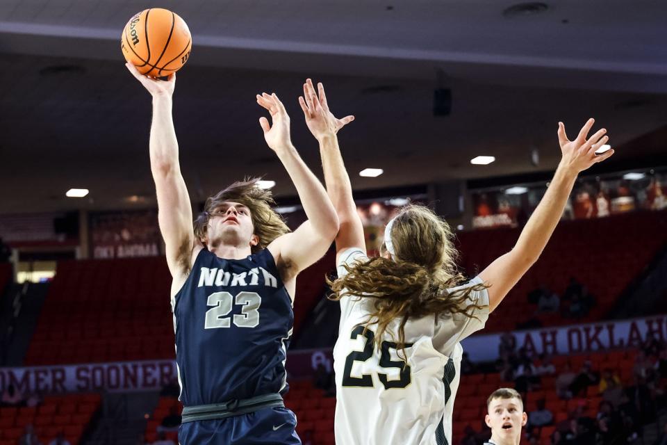 Edmond North's Dylan Warlick (23) jumps to shoot during the boys high school basketball championship game between Broken Arrow and Edmond North at the Lloyd Noble Center in Norman, Okla., on Saturday, March 11, 2023. 