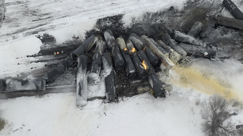 A BNSF train carrying ethanol and corn syrup derailed and caught fire in Raymond, Minn., Thursday, March 30, 2023. BNSF officials said 22 cars derailed, including about 10 carrying ethanol, and the track remains blocked, but that no injuries were reported due to the accident. The cause of the derailment hasn't been determined. (Mark Vancleave /Star Tribune via AP)