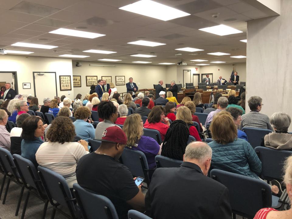 A crowd fills a South Carolina Senate hearing room as a Senate committee considers a strict "heartbeat abortion" ban on Tuesday, Nov. 5, 2019, in Columbia, South Carolina. A Senate committee sent the bill to the Senate floor, setting up a potential 2020 election year fight (AP Photo/Jeffrey Collins)