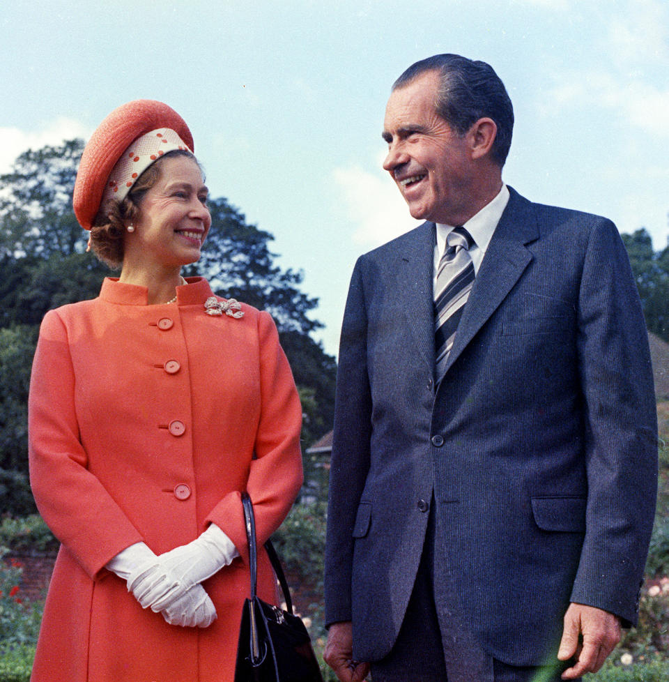 FILE - In this 1970 file photo, Queen Elizabeth II, left, reacts with U.S. President Richard Nixon, at Chequers, in Buckinghamshire, England. (AP Photo, File)